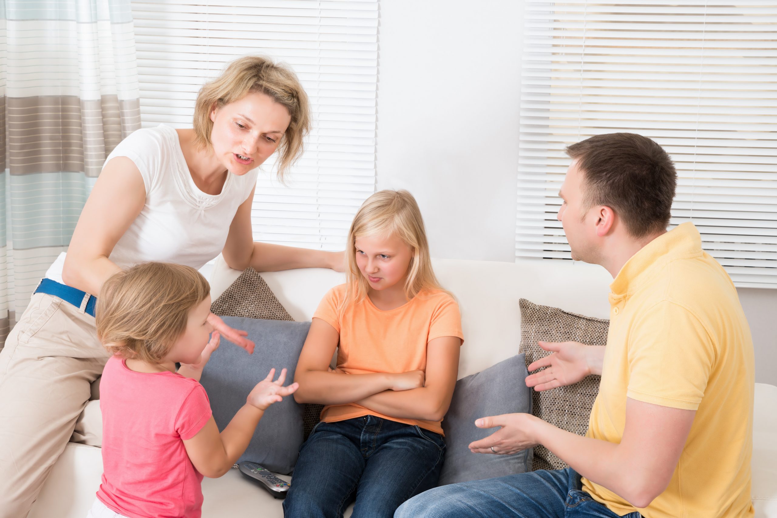 Image of an upset family having argument at home. If you need support in reconnecting with your partner, learn how couples therapy in Englewood, CO can help you.