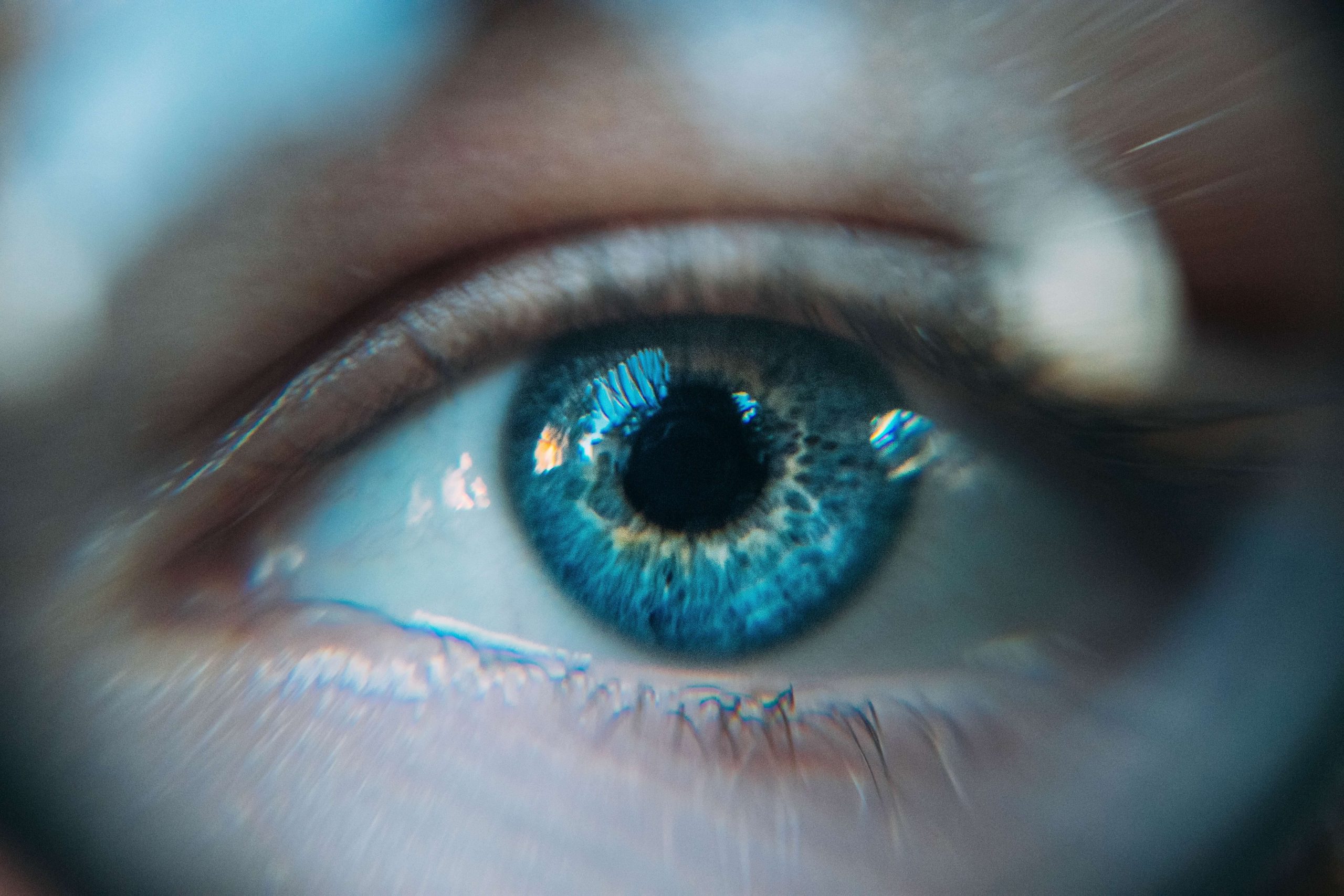 Closeup image of an blue eyeball. Discover how EMDR for anxiety therapy in Englewood, CO can help you manage your anxiety symptoms!