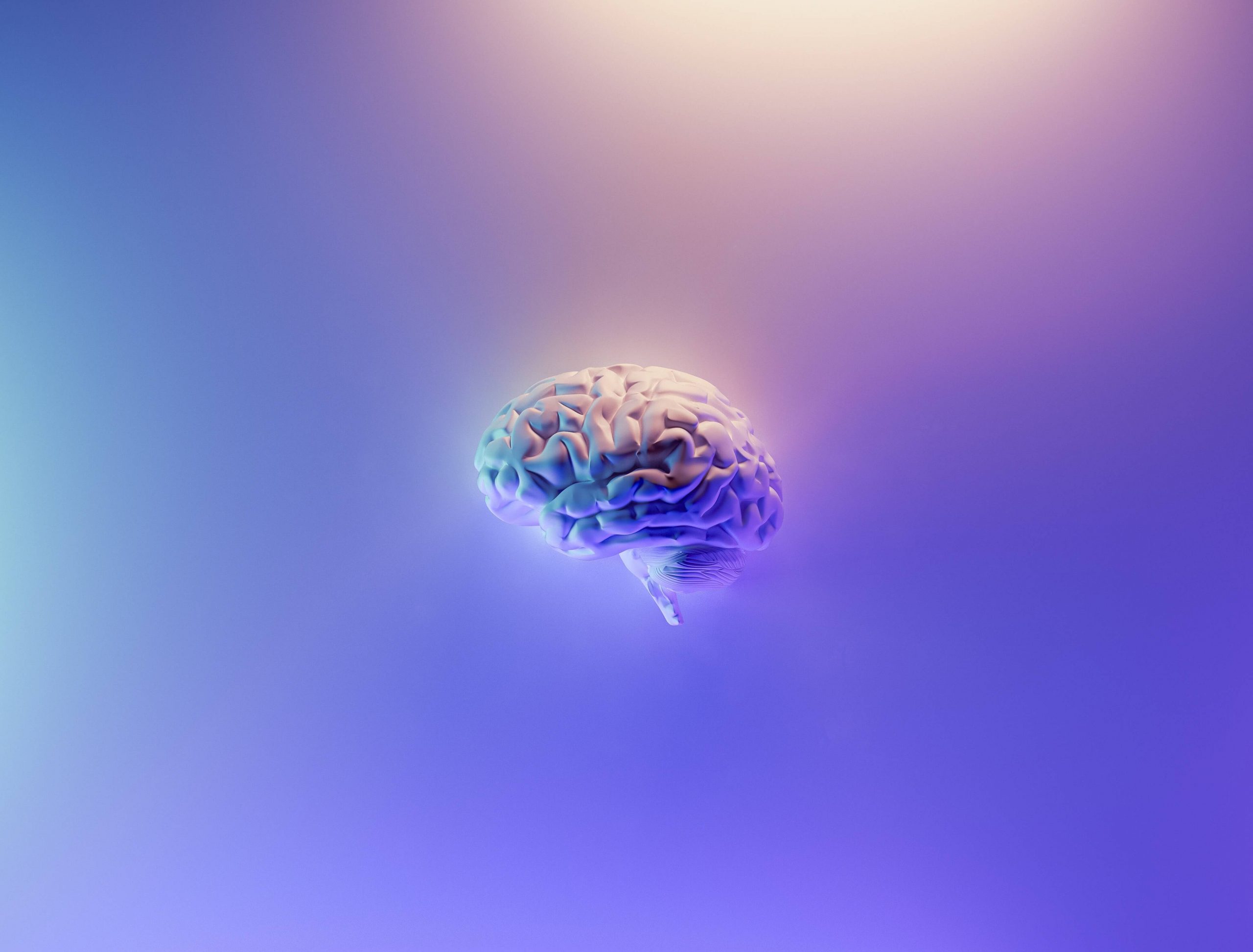 Image of a brain with a purple background. With the help of neurofeedback therapy in Englewood, CO you can begin overcoming your symptoms related to anxiety, ADHD, Autism and more.