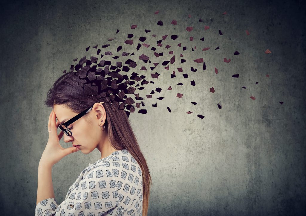 Conceptual image of a woman experiencing memory and focus challenges, symbolizing the need for ADHD testing in Greenwood Village, CO, ADHD testing Denver, and an ADHD test for women.