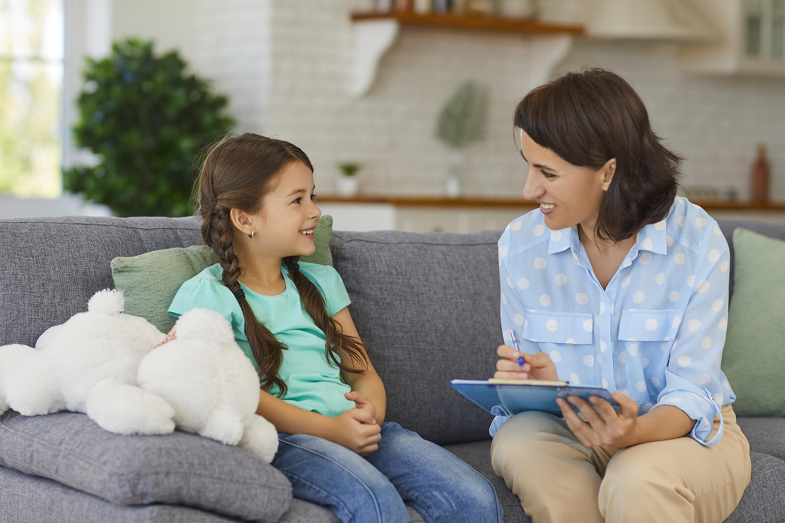 Warm counseling session highlighting a child therapist in Englewood, CO and compassionate child therapy in Englewood, CO, often following adhd testing in Denver or adhd testing in Greenwood Village, CO. 