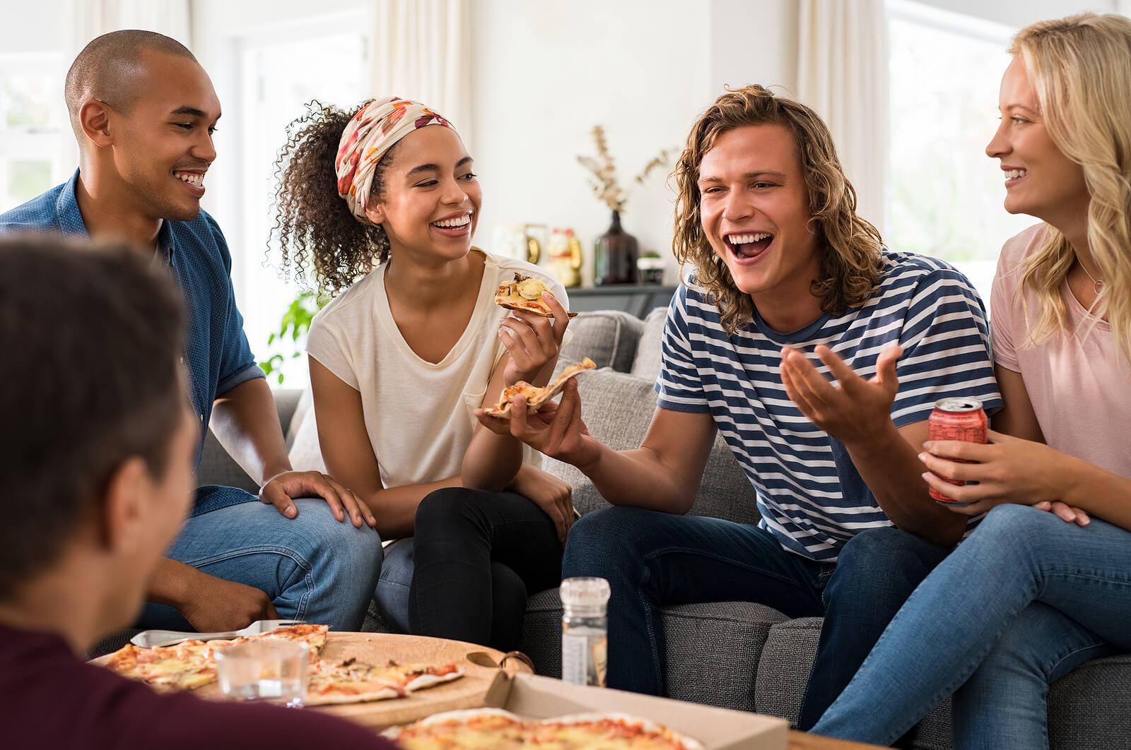 Group of friends | autism treatment for adults in colorado | autism testing in littleton, co | autism evaluation denver | Greenwood Village, co | littleton, co | Denver, co A diverse group of young adults laugh and talk together on a couch over pizza, fully at ease in each other's company. This sense of belonging and genuine community is one of the most meaningful outcomes that autism treatment for adults in Colorado can help make possible. Whether through therapy, support groups, or autistic-led spaces, an autism therapist in Greenwood Village, CO can help clients take steps toward finding their people and experiencing the deep validation that comes with being truly understood.